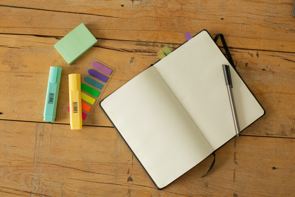 A diary, pen and highlighters.